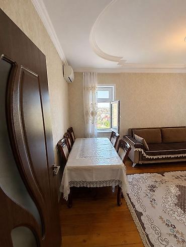 zabratda: Mebel və texnika ilə təchiz olunmuş işıqlı mənzil. - Geniş qonaq — 2