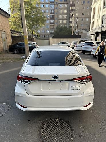 лимузин цена: Toyota Corolla: 2022 г., 1.8 л, Автомат, Гибрид, Седан — 6