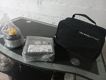210 2 2: Набор для ремонта и подкачки шин Tire Mobility Kit. Состав: - — 2