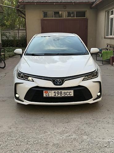 Унаа: Toyota Corolla: 2022 г., 1.8 л, Вариатор, Гибрид, Седан — 1