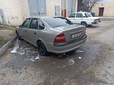 ravon az: Opel Vectra sedan - Kuzov: 4 qapılı sedan, gümüşü rəng - Nömrə kodu — 5