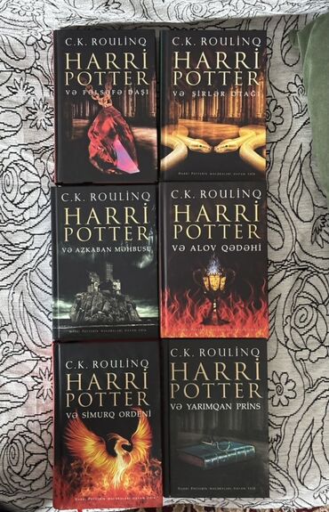 Bədii ədəbiyyat: Harry Potter-in ilk 6 kitabı. Kitablar tam səliqəlidir. Yazı və ya