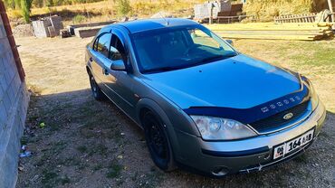 балыкчы машины: Ford Mondeo седан (примерно 2003–2006 гг.), серебристый металлик