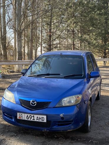 бмв е39 ош: Mazda Demio: 2004 г., 1.3 л, Автомат, Бензин, Универсал