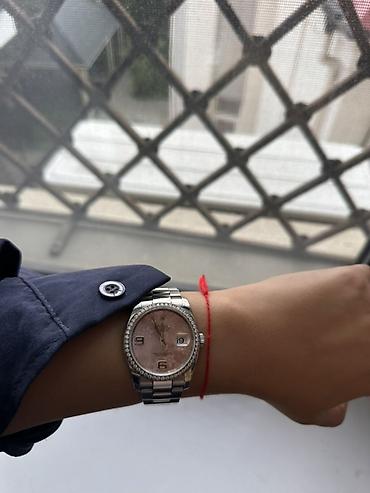 Rolex Datejust qadın qol saatı. Briliant qashlarla çevrilib. -