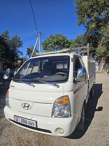 кампрессор воздушный: Hyundai Porter II бортовой грузовик - Дизель CRDi 2.5 (надпись CRDi — 1