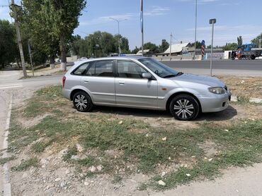 мини электромобиль: Mazda 323: 2003 г., 1.6 л, Автомат, Бензин, Хетчбек