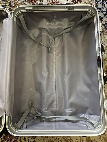 trolly bag: Чемодан на колёсах, цвет стальной синий. Особенности: - Прочный — 2