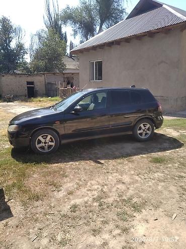 нур мото: Nissan Almera: 2003 г., Механика, Бензин, Хэтчбэк — 3