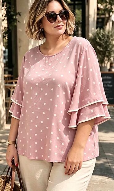 bele bluze: Ženska bluza sa tufnama – model sa karner rukavima
2000
Din
Do xxl — 7