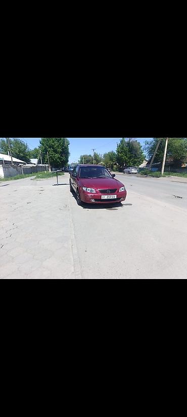 обмен на квартиры: Mazda 323: 2001 г., 1.8 л, Автомат, Бензин, Седан — 2