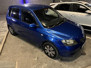 Mazda Demio: 2004 г., 1.3 л, Автомат, Бензин, Хэтчбэк