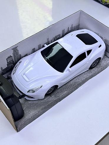 пультовые машины игрушки: Радиоуправляемая машинка, масштаб 1:18 - Модель: спортивное купе — 1