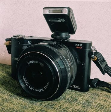 samsung s1: Фотоаппарат Samsung NX200 Матрица: CMOS, стандарт APS-C (23,4х15,6