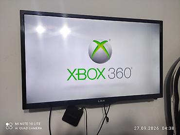 xbox 360 lt 30 бу: Игровая консоль Xbox 360 (версия Slim/E) в черном корпусе. - Подходит — 1