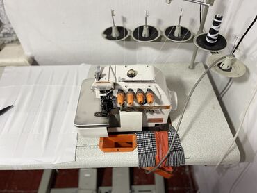 шагающая швейная машина: Швейная машина Оверлок, Автомат
