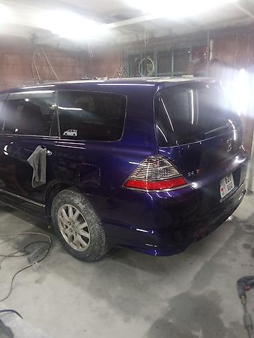 honda logo: Honda Odyssey: 2006 г., 2.4 л, Бензин, Минивэн — 3
