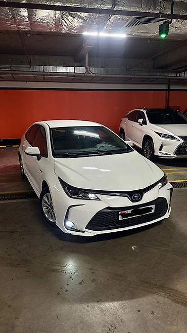 techno spark: Toyota Corolla: 2023 г., 1.8 л, Автомат, Гибрид, Седан — 1