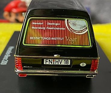 Avtomobil modelləri: Коллекционная модель Mercedes-Benz 200 W123 Hearse black 1982 Schuco — 20