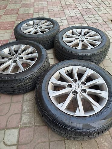 porsche disk: Məhsul: 4 ədəd orijinal Toyota yüngül lehimli disk + şin komplekti - — 1