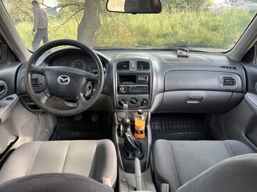 Mazda: Mazda 323: 2002 г., 1.6 л, Механика, Бензин, Хэтчбэк — 7