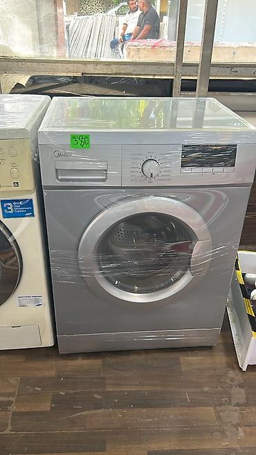 Midea paltaryuyan maşın, ön yükləməli model. Gümüşü rəngdə korpusa lalafo.az -da Midea paltaryuyan maşın, ön yükləməli model. Gümüşü rəngdə korpusa