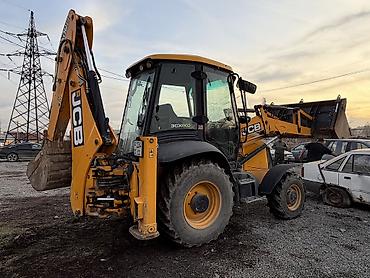 Другие автомобили: Экскаватор-погрузчик JCB желтого цвета.Машина имеет кабину оператора с — 16