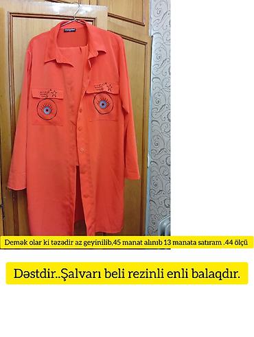 dest geyimler: - Ağ rəngli, qolsuz şişmə jilet. Ön hissədə qızılı rəngli fermuar, iki — 2