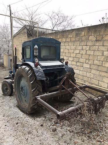 traktor starter: Məhsul: Mavi rəngli təkərli traktor və kənd təsərrüfatı aqreqatları — 2