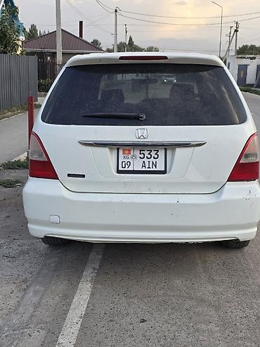 первый хозяин владелец: Honda Odyssey: 2002 г., 2.3 л, Автомат, Бензин, Минивэн — 4