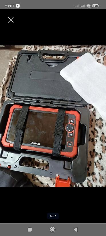 Другое автосервисное оборудование: Профессиональный автосканер LAUNCH (таблет-прибор) Описание: - — 7