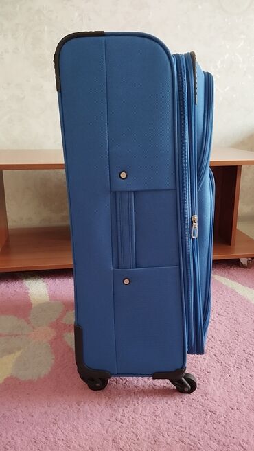 Чемоданы: Чемодан, Новый, Средний (40 - 70 л), С выдвижной ручкой, Водонепроницаемость, Вращающиеся колеса на 360° — 3