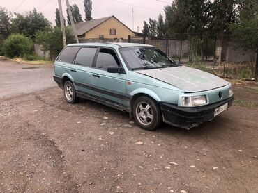 шины 2356516c: Универсал Volkswagen Passat в светло-бирюзовом цвете, оснащенный