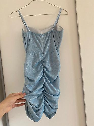 Haljine: Ženska mini haljina sa tankim bretelama, dostupna u više boja: - crna — 18