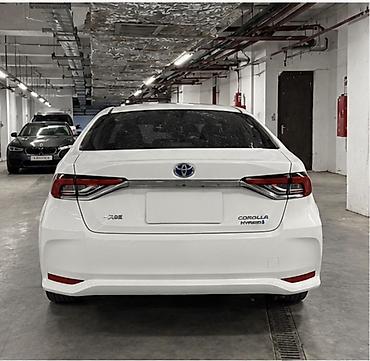 byd e1: Toyota Corolla: 2020 г., 1.8 л, Вариатор, Гибрид, Седан — 4
