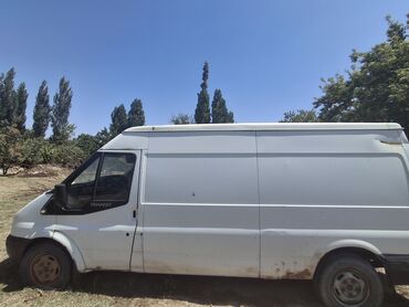 диск транзит: Белый фургон Ford Transit, идеально подходящий для перевозки грузов