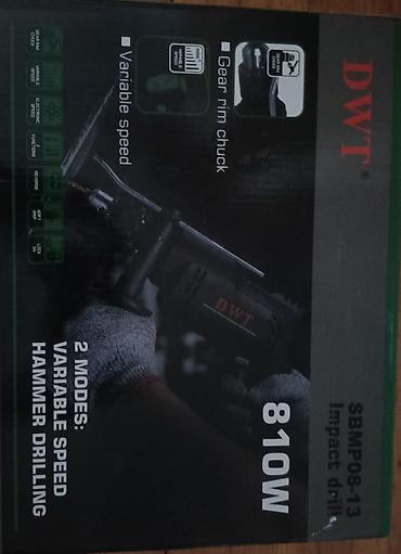 direl: DWT SBMP08-13 zərbəli matkap – 810W Xüsusiyyətlər: - Güc: 810 W - 2 — 2