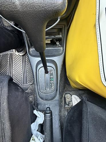 мини машины: Daihatsu Cuore: 2004 г., 1 л, Автомат, Бензин, Хэтчбэк — 4