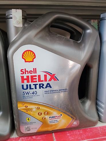 she: Shell Helix Ultra 5W-40 — полностью синтетическое моторное масло для — 1