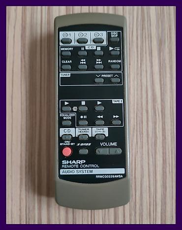 kasetofon: SHARP daljinski upravljač za audio sistem. Poklon 2AA baterije — 1