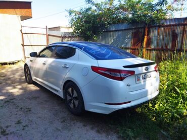 обмен на легковой автомобиль: Kia K5: 2012 г., 2 л, Автомат, Гибрид, Седан