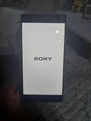 телефон режим 11: Sony Б/у, 32 ГБ, цвет - Черный