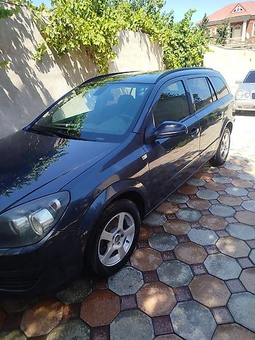 Opel Astra H Caravan (universal kuzov) - Kuzov: 5 qapılı universal lalafo.az -da Opel Astra H Caravan (universal kuzov) - Kuzov: 5 qapılı universal