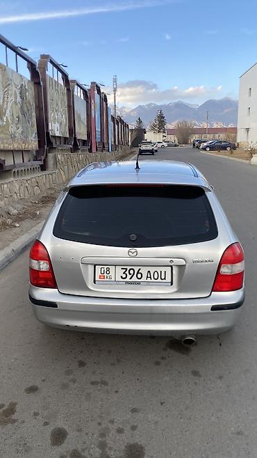 Mazda: Mazda 323: 1998 г. — 1