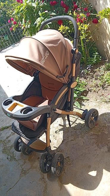 Gəzinti arabaları: Uşaq arabası – Baby Land, qəhvəyi rəng Xüsusiyyətlər: - Geniş — 1