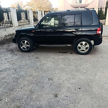 mitsubishi pajero 2000: Mitsubishi Pajero: 1.8 l | 1998 il Ofrouder/SUV — 4