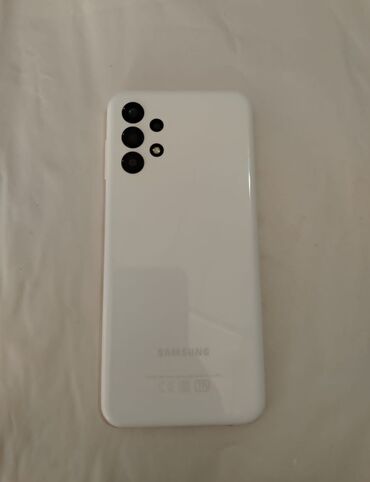 samsung e390: Samsung Galaxy A13, 32 GB, rəng - Ağ, Barmaq izi, İki sim kartlı, Face ID