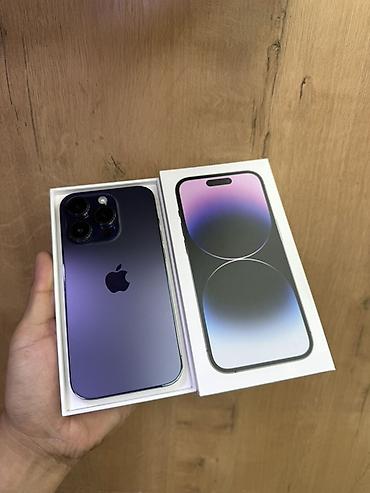 mini 3 pro: IPhone 14 Pro в фирменном тёмно-фиолетовом цвете. Смартфон с плоскими — 1