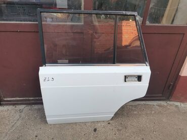 Auto delovi: Vrata zadnja leva Lada 2104 Karavan(bela)ZL3. Skinuta sa rastavljenog — 1
