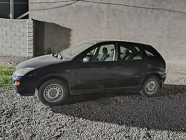 аккорт тарнео: Ford Focus: 2001 г., 1.8 л, Механика — 4
